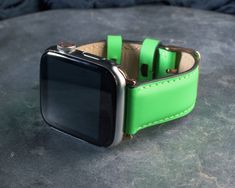 "*Handmade item *Material: Leather *Style: Minimalist *Can be personalized *Made to Order Give us a chance to help your apple watch to reflect your soul! Let's personalize your apple watch to look rich and classy! It is time to personalize your apple watch! FEATURES: ✔️Our watch bands are suitable for all Apple Watch series; 1, 2, 3, 4, 5, 6, and SE ✔️Please pick your watch's diameter; 38mm, 40mm, 42mm, or 44 mm. Look at the back of your apple watch to find out the specifications. You will see t Modern Green Rectangular Apple Watch Band, Modern Handmade Apple Watch Band As Gift, Handmade Modern Apple Watch Band For Gift, Modern Handmade Apple Watch Band Gift, Handmade Green Watch Bands For Everyday Use, Modern Handmade Watch Accessories As Gift, Handmade Modern Watch Accessories As Gift, Green Watch Accessories With Bracelet Strap As Gift, Rectangular Green Apple Watch Band As A Gift