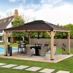 a gazebo sitting on top of a lush green field next to a swimming pool