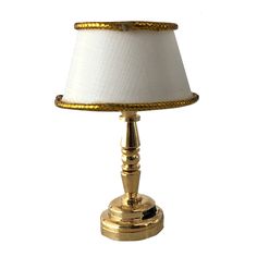 PRICES MAY VARY. A Timeless Piece: Realistic battery powered dollhouse accent lamp; gold-finish base with a beautiful cream colored shade; Suitable for 3 inch to 12 inch dolls (1/24 scale to 1/6 scale) Elegant & Class: Masterfully crafted, the LED lamp incorporates a small battery inside its base with a switch to turn the light on and off. The battery is included in the unit so you can start using the light right away. If needed, the battery is replaceable using a small screwdriver. Dimensions: Dollhouse Table, Mini Dollhouse, Bedside Desk, Small Table Lamp, Accent Lamp, Lamp Led, Dollhouse Accessories, Dolls House, Vintage Bohemian