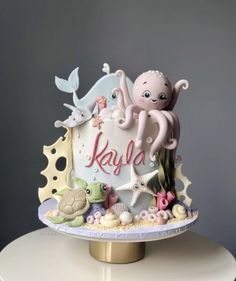 a cake with an octopus and sea animals on it