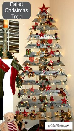 a christmas tree decorated with teddy bears and stockings