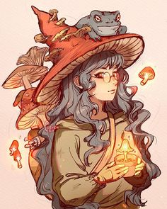 a woman in a witches hat holding a lit candle