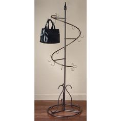 a coat rack with a purse on it