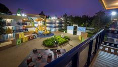 an outdoor play area at night with toys and games