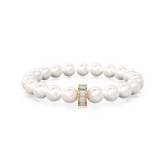 White Pearl Smooth Round Sphere Ball Bead Bracelet with Baguette Diamond Charm Beads - 10mm Gold Details: Bead Size: 10mm Metal: 14k yellow gold Diamond Details: Baguette: 3x1.5mm 18 pcs. Bracelet Details:  Gemstone - White Pearl Beads Shape - Round Size: 8 mm Weight: 20 carats approx Length: 7 - 7 ¼ inches Quality - AAA+ Grade * Please note that Gold orders are made to order in your choice of Gold KT / Color & Beads drilled to choice so please look at handling time carefully before placing orde Sphere Ball, Color Beads, Charm Beads, Diamond Charm, Baguette Diamond, Black Opal, Real Diamonds, White Pearl, Gold Details