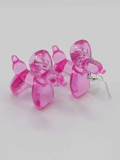 These Earrings are made from little plastic figurines! Pink Resin Novelty Earrings, Pink Plastic Party Earrings, Pink Novelty Earrings For Party, Pink Plastic Earrings For Party, Cute Plastic Party Earrings, Playful Pink Plastic Earrings, Handmade Clear Plastic Earrings, Quirky Pink Earrings, Pink Novelty Earrings