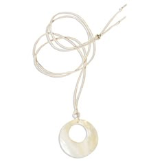 Visit our website at www.ShopGeminiJewels.com for better prices and latest products. Spring '23 mermaid-core collection. Genuine mother-of-pearl shell circle pendant on an adjustable cream cord.  Note that the shell pendants are natural and may vary slightly in color. Measurements - Chain length: Adjustable from 14 inches - 38 inches - Charm measurements: 40 x 40 mm Materials - Chain material: Cotton  - Charm material: Genuine mother-of-pearl, freshwater pearl - Nickel & lead free Delicately han Heart Locket Necklace, Mother Of Pearl Necklace, Pearl Necklaces, Jewelry Lookbook, Custom Name Necklace, Shell Necklace, Shell Jewelry, Circle Necklace, Unisex Jewelry