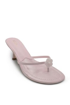 Playful and charming, our Clara heel is adorned with a flower detail. 90s inspired, the satin material adds a feminine touch. Featuring a low kitten heel for comfortable all day wear. Sizing: true to size Round thong toe Flower seashell detail Slip on mule Approx. 2" kitten heel Pink Kitten Heels, Flower Heels, Slip On Mules, Flower Detail, 90s Inspired, Pink Heels, Wide Boots, Satin Material, Kitten Heel