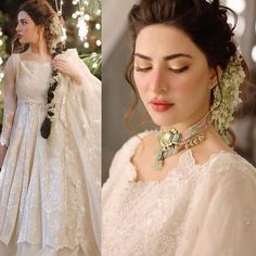 an image of a woman wearing a wedding dress and jewelry in front of a christmas tree