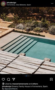 an aerial view of a swimming pool in the desert