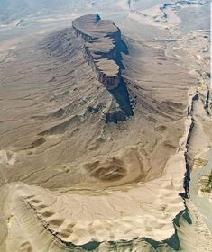 an aerial view of the desert and mountains