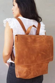 Check out #Mayko 's new backpack! With its timeless design, in simple lines, to complete your casual stylish look! A great choice as a Work Bag or as a School Bag Or even as a Diaper Bag. Additional wristlet pouch, outside pocket and monogram available. #Leather #Backpack #School #Workbag #Laptop #Laptopbag #Leatherbag #Handmade #Women #Womenbag #Maykobags Wristlet Pouch, Brown Backpacks, Casual Crossbody Bag, Brown Leather Backpack, Minimalist Bag, Women Leather Backpack, Backpack School, Daily Tasks, Diaper Bag Backpack