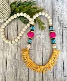 Yellow Beaded Necklaces With Large Beads For Summer, Summer Yellow Beaded Necklaces With Large Beads, Vibrant Beaded Beach Necklaces, Vibrant Beaded Necklace For Beach, Vibrant Beaded Beach Necklace, Adjustable Yellow Necklace For Beach, Adjustable Yellow Necklace For The Beach, Turquoise Necklaces With Wooden Beads For Beach, Turquoise Necklace With Wooden Beads For Beach