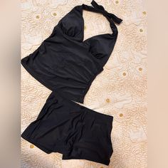 I Have 2 Sets Of This Swimsuit. Both New With Tags, One Is A Medium The Other Is A Large. $20 Each. Smoke Free Pet Free. They Have Been Sealed Up. Black Tankini With Built-in Shorts, Chic Fitted Short Swimwear, Black Short Tankini For Beach, Black Short Length Tankini For Summer, Fitted Black Shorts For Poolside, Black Short-length Tankini For Summer, Black Summer Tankini With Built-in Shorts, Black Tankini With Built-in Shorts For Summer, Chic Black Swimwear In Short Length