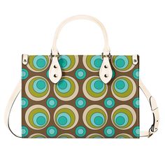 This funky satchel is a blast from the past, with a mid century modern design featuring groovy orbs. With its retro style, it's sure to make a statement while also offering practicality. Carry all your essentials in one stylish bag. Get ready to turn heads and embrace your inner hippie! Premium PU Leather: Crafted from high-quality PU leather for durability and style. Versatile Sizing: Available in three sizes to suit your needs and preferences. Sturdy Top Handles: Features two sturdy top handle Retro Multicolor Satchel For Everyday Use, Multicolor Retro Satchel For Everyday Use, Retro Everyday Shoulder Bag, Retro Shoulder Bag For Everyday Use, Retro Multicolor Satchel For Daily Use, Retro Green Satchel Shoulder Bag, Retro Satchel For Everyday Use, Retro Green Satchel In Tote Shape, Retro Multicolor Satchel For Shopping