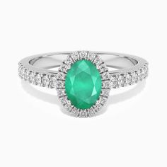 Description Indulge in sophistication with our Oval Cut Sakota Emerald Ring Halo, a masterpiece of sterling silver gemstone jewelry. Skillfully crafted, this ring showcases a mesmerizing Sakota emerald in an elegant oval cut, encircled by a delicate halo of sterling silver brilliance. The Sakota emerald, renowned for its rich green hues, brings an aura of luxury and refinement to any attire. Whether for special occasions or everyday elegance, this exquisite halo ring is sure to captivate attenti Natural Emerald Rings, Ring Halo, Silver Gemstone Jewelry, Green Hues, Rich Green, Emerald Earrings, Emerald Jewelry, Green Gemstones, Ring Ideas