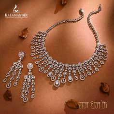 Make every moment extraordinary with our dazzling diamond set that graces your neckline & the enchanting matching pair of earrings that will add a touch of sophistication to your look. This piece is meticulously crafted to perfection that radiate brilliance and allure. Visit @kalamandirjewellers today and shine like ever before with #SajDhajKe For further information contact us at - 9510970230 #kalamandirjewellers #Sajdhajke #22ktgold #Antiquejewellery #jewellery #handmadejewellery Solitaire Necklace, Solitaire Necklaces, Diamond Set, Antique Jewellery, Beaded Jewelry, Handmade Jewelry, Necklaces, Chain, Gold