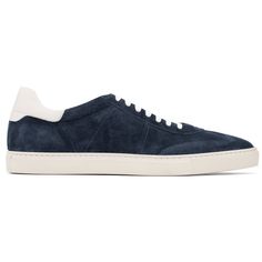 The low profile Solaro has a retro-inspired vibe. Crafted from supple navy suede and trimmed with off white calf, you can wear these with denim, khakis or shorts. Pair with our Navy Blue Suede Belt or Navy Blue Woven Suede  Belt. * Neutral color rubber sole for comfort & traction * Made from Italian calf suede * Cushioned foot bed * Fully leather lined * Padded collar for a secure, comfortable fit * Luxury travel bag and extra laces included Luxury Travel Bag, Formal Belts, Formal Accessories, Suede Belt, Shoe Tree, Foot Bed, Retro Sneakers, Blue Suede, Neutral Color