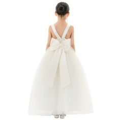 This gorgeous flower girl dress features an open back satin bodice with an elegant pre-tied bow in the back. The tulle skirt has 6 layers, top 3 layers are made of tulle. The 4rd is a layer of satin lining, 5rd layer is an attached crinoline netting for additional fullness and the 6th layer is another layer of soft satin lining to bring comfort to your little girl while wearing the dress. Size: size 12.  Color: Beige.  Gender: female.  Age Group: kids. Silk Dress Flower Girl, White Flower Girl Dresses Simple, Flowergirls Dress White, Dresses For Flower Girls, Halter Flower Girl Dress, Formal Flower Girl, Classic Flower Girl Dress, Satin Flower Girl Dress With Pearls, Baby Girl Tulle Dress