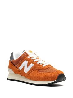 New Balance 574 "Orange White" Sneakers - Farfetch Sporty Sneakers With Logo Patch For Sports, Orange Sneakers With Boost Midsole For Streetwear, Orange High-top Sneakers With Contrast Sole For Sports, Orange High-top Sneakers With Contrast Sole For Streetwear, Sporty Orange Custom Sneakers With Contrast Sole, Orange Low-top Sporty Sneakers, Orange Low-top Sneakers With Contrast Sole, Orange Custom Sneakers With Contrast Sole, Sporty Custom Orange Sneakers With Contrast Sole