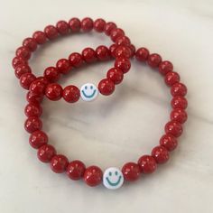 This listing is for those needing an extra bracelet(s) for the mommy & me sets! For those of you with multiple kiddos etc. What You’ll Receive: (1) EXTRA Bracelet to go with Back to School set - Kid size measures about 5.5” unless otherwise requested. - Adult (or teen) size measures 6.75” unless otherwise requested. Ordering Notes: - Select your bracelet color from the drop down menu. Bracelets will come with gold smile & accent beads unless otherwise requested in the customization box. - If you Red Novelty Beaded Bracelets For Friendship, Personalized Red Friendship Bracelets For Everyday, Red Personalized Friendship Bracelets, Personalized Red Novelty Bracelets, Everyday Personalized Red Friendship Bracelets, Personalized Red Friendship Bracelets, Fun Red Jewelry For Friendship, Fun Red Bracelet For Gift, Fun Red Bracelet Gift