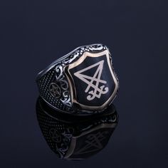 Mens fabous Sigil De Lucifer symbol ring %100 handmade customization available item. Silver devil symbol pentagram signet ring. You can contact with me for other gothic symbols and i can work on item with your special symbol for you. CUSTOMIZATION: I can make the same ring of 10K GOLD ,14K GOLD, 18K GOLD or 22K GOLD at an extra cost. Also i can make same ring with different top and side symbols. Please contact me for details if you're interested. Ring Details Metal: 925 Sterling SILVER and Bronz Lucifer Morningstar Ring, Lucifer Symbol, Devil Symbol, Gothic Symbols, Satanic Bracelet, Satanic Ring, Satanic Accessories, Pentagram Ring, Sigil Of Lucifer