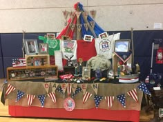 a table covered in american flags and other items