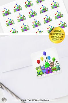 an envelope with stickers on it and some balloons