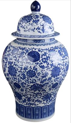 a blue and white vase with a lid on the top is sitting in front of a white background