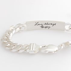 This heavy weight, sterling silver bracelet works well on all bodies. Engrave it inside and out with your own writing, fingerprints, doodles or important dates. ▪️ Qty: 1 Bracelet▪️ Material: Sterling Silver or Yellow Gold Plated (over sterling base)▪️ Engraving Plate Measures: 1.62" x .37" (41mm x 9.5mm) ▪️ Satin brushed texture. For good visibility, stay within a 10 word limit (per side) when personalizing this piece. Sizing guide is provided in the product photos. Customizable Classic Sterling Silver Bracelets, Classic Customizable Sterling Silver Bracelets, Customizable Sterling Silver Bracelets For Everyday, Anniversary Engraved Sterling Silver Name Bracelet, Adjustable Sterling Silver Jewelry With Engraved Text, Customizable Silver Name Bracelet For Everyday, Sterling Silver Name Bracelet With Engraving For Anniversary, Silver Customizable Name Bracelet For Everyday, Engraved Sterling Silver Chain Bracelet For Gift