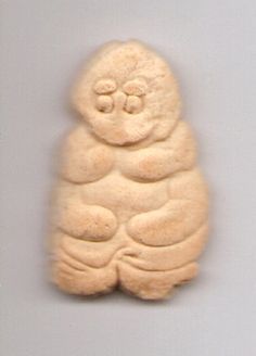 a close up of a gummy bear on a white surface