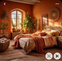 a bed room with a neatly made bed and potted plants