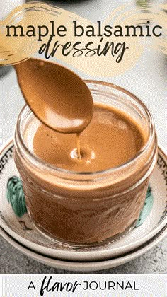 a spoon is being used to dip chocolate into a jar with the words maple balsamic dressing on it