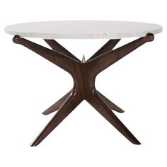 a white marble table with wooden legs