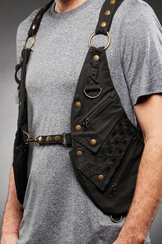 A holster vest with pockets to hold all your stuff Harness Fashion Mens, Cosplay Sewing Patterns, Tactical Harness, Harness Fashion, Backpack Design, Holster Bag, Vest With Pockets, Sling Bags, Sewing Leather