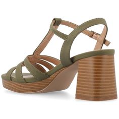 The Alyce platform heel sandal from Journee Collection boasts a stylish design with a 2 3/4-inch heel height, offering a perfect blend of elegance and comfort. The platform, measuring 1/2-inch, enhances stability, while the ankle strap with a buckle closure ensures a secure fit. Crafted with faux leather in both the upper material and lining, and featuring a 4 mm Tru Comfort Foam™ footbed, these sandals provide a fashionable look without compromising on comfort. Leather Platform Sandals, Open Toed Heels, Platform Sandals Heels, Open Toe Shoes, Buckle Shoes, Round Toe Heels, Platform Heel, Heel Sandal, 4 Inch Heels