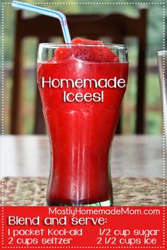 a red drink sitting on top of a table