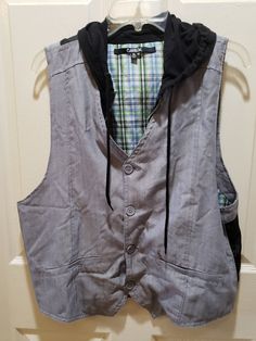 This reversible vest can be formal in the colors of grey, black or in the form of casual with a green blue white plaid vase. It has grey bottom for a formal look or a zipper for a casual look. Great piece. This vest is an xl size, mark carbon, 65 % polyester and 35 % rayon. Note:  If for male it may fit a large size and for female it will fit  an XL size is my opinion. Plaid Vase, Mens Formal Vest, Formal Vest, Plaid Vest, Reversible Vest, Mens Vests, Mens Formal, Vest Outfits, Formal Looks