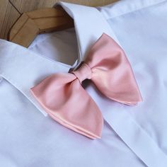 "Oversized Bow Tie in Light Pink Satin. Pre-tied and adjustable. Bow tie size - Width: 12 cm /4,7\" | Height: 10 cm / 3.93'' The adjustable strap takes it to 21\" in length, making it a great accessory that can be adjusted for comfort and fit or given as a gift if you are unsure of neck size. Perfect for formal or causal use. **bowties are shipped in a small shipping box to keep them from being damaged**" Pink Bow Tie For Summer Formal Events, Elegant Spring Bow Tie For Gift, Elegant Spring Bow Tie As A Gift, Pink Bow Tie For Spring Formal Occasions, Satin Bow Tie As Summer Gift, Summer Bow Ties For Black Tie Events, Summer Black Tie Bow Tie With Satin Bow, Solid Satin Bow Tie For Summer, Summer Bow Tie Back Tie As A Gift