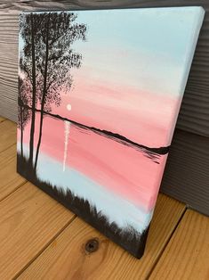 an acrylic painting of trees on a pink and blue sunset with the moon in the distance