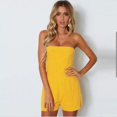 This Is A Bright Yellow Jumpsuit With Back Ties. Fits Small/Xs Never Worn Cleaning Out Closet. Clean, Smoke Free Pet Free Home Summer Strapless Stretch Jumpsuits And Rompers, Strapless Summer Bodysuit For Night Out, Strapless Bodysuit For Night Out In Summer, Strapless Bodysuit For Summer Night Out, Chic Strapless Bodysuit For Summer, Trendy Short Summer Jumpsuits And Rompers, Trendy Summer Jumpsuits And Rompers In Short Length, Trendy Short Length Summer Jumpsuits And Rompers, Summer Style Jumpsuits And Rompers In Short Length