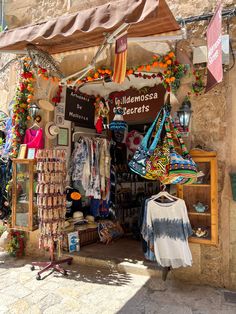 an outdoor shop with many items on display