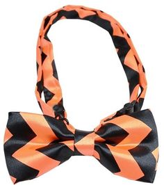 an orange and black bow tie on a white background