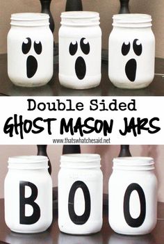 four mason jars with faces painted on them and the words boo spelled in black ink