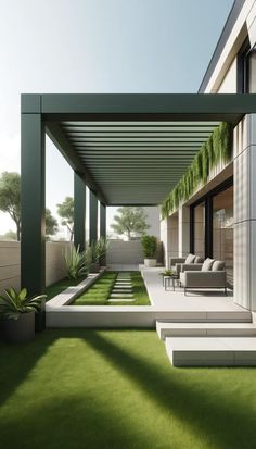 an outdoor living area with grass and plants