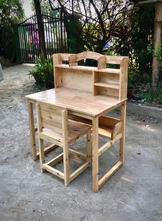 a wooden desk and chair made out of wood