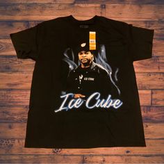 Up For Sale Today Is An Ice Cube Shirt Measures 21 Inches Pit To Pit And 29 Inches Length! Condition Is 10/10, Brand New With Tags If You Have Any Questions Please Feel Free To Message Me! Thank You So Much For Looking! Check Out My Page For More And We Can Bundle Up Hip Hop Shirt With Front Print For Streetwear, Hip Hop Streetwear Shirt With Front Print, Sporty Character Print Tops For Streetwear, Urban Character Print Tops For Streetwear, Casual Fitted Top For Fan Merchandise, Cool Graphic Print Tops For Streetwear, Cool Short Sleeve Tops For Streetwear, Urban Fitted Shirt For Streetwear, Fitted Logo Print Shirt For Streetwear