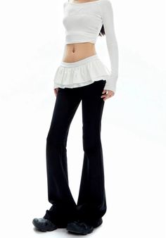 Discover the essence of effortless style with our Bell Bottom Ruffle Waistband Skirt-Pants, where comfort meets chic. 

Made with a blend of premium fabrics, these skirt-pants feature a unique ruffle waistband that adds a touch of whimsy to your ensemble. The thoughtful design boasts bell-bottom flares for a leg-elongating effect and a refreshingly light fabric that makes summer heat bearable. Its airy silhouette and black color ensure it pairs perfectly with tops of any style for a look that's Feminine Aesthetic Outfits, Grunge Accessories, Black Flare Pants, Sweatshirt Set, Black Flare, Feminine Aesthetic, Flared Pants, Bell Bottom, Casual Style Outfits