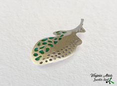 "Natural Leaf Brooch made of 925 silver and enamel. This handmade enamel Leaf brooch is inspired by the leaf shapes and their life cycles. The one of a kind piece is enhanced with the use of green and turquoise enamel. It's a very organic piece cut. This modern silver brooch is a unique piece of contemporary jewelry. Details: Weight: 10 g Width: 34 mm = 1.34\" Length: 86 mm = 3.44\" Enjoy and thanks for looking!! Follow me www.facebook.com/jewelersoul Visit my shop for a matching also pendants: Unique Green Enamel Pin, Green Enamel Brooch Pin As Gift, Green Brooch Enamel Pin For Gift, Green Sterling Silver Brooch Jewelry, Green Sterling Silver Brooch, Green Sterling Silver Brooches As Gifts, Green Sterling Silver Brooch For Gift, Green Sterling Silver Brooches For Gifts, Sterling Silver Green Brooch