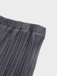 Introducing the Wool Pleated Skirt-Dark Grey, a stylish and versatile addition to your wardrobe. Its pleated design adds a touch of elegance, while the dark grey color pairs well with any outfit.**Although we try our best to ensure none of our products contain shatnez, please be sure to check any product that contains wool or linen before wearing. Gray Pleated Bottoms For Fall, Gray Pleated Bottoms For Winter, Winter Pleated Gray Bottoms, Pleated Gray Winter Bottoms, Winter Gray Pleated Bottoms, Gray Pleated Winter Bottoms, Fall Pleated Gray Skirt, Elegant Gray Pleated Bottoms, Casual Gray Pleated Skirt